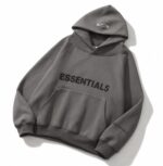 Dark grey Essentials hoodie for men and women, pullover style, casual winter wear.