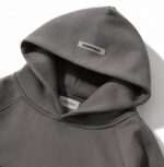 Dark Grey Essentials Hoodie Men & Women - Image 3